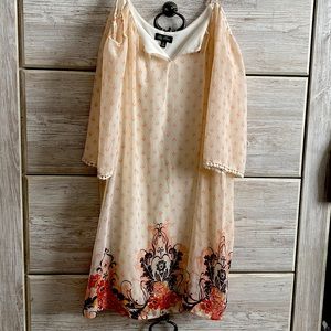 This dress is a kids formal dress, it is an xs and has a white slip underneath.